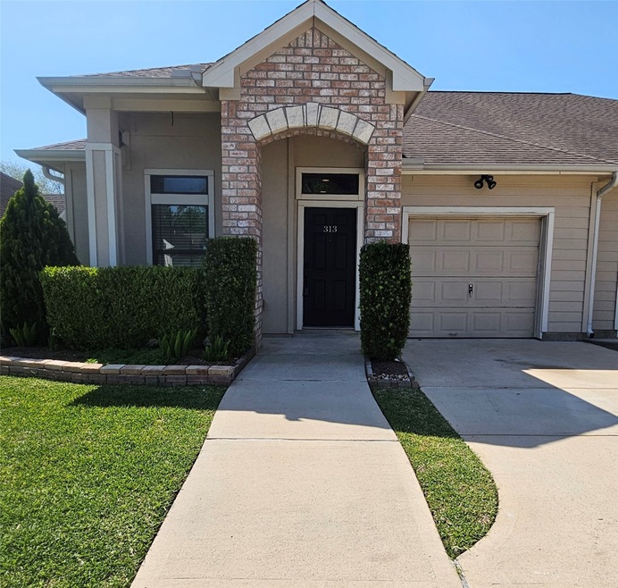 Front View of Unit #313, Assigned Driveway Space a