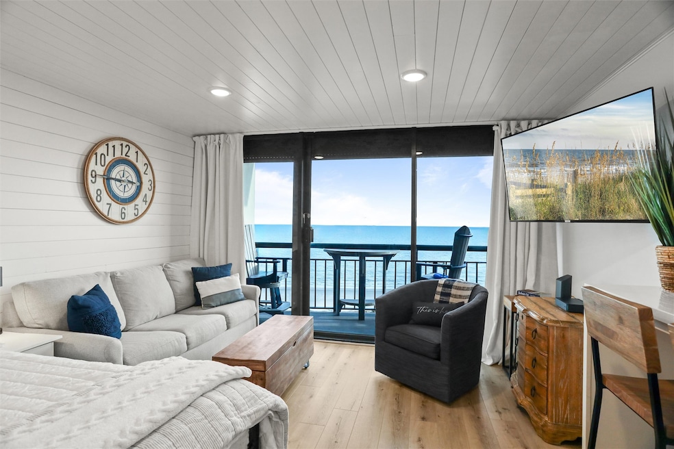 This is a cozy beachfront living room with a clean