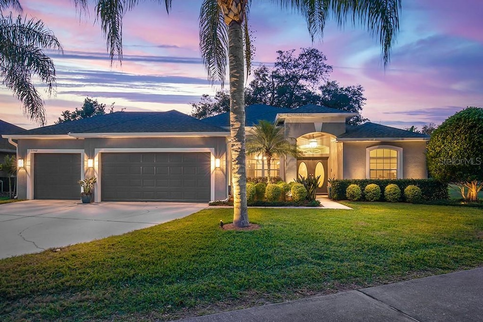 Block home with 3 car garage on cul-de-sac. Landscape lighting welcomes you home!