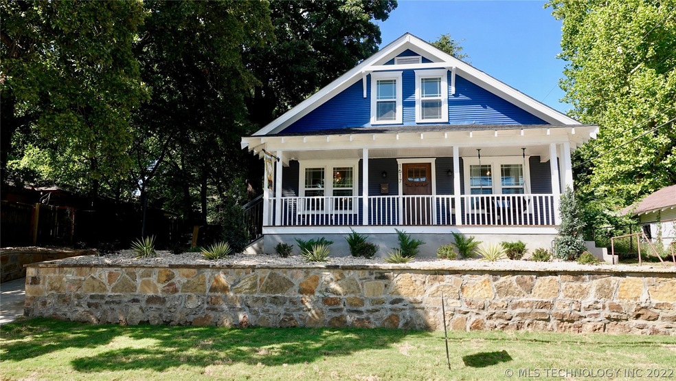Front of House with Beautiful Landscaping 
