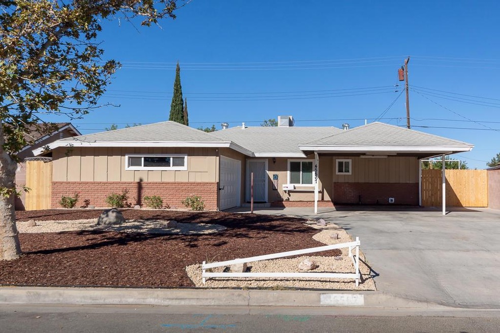Front Exterior/Carport/Driveway