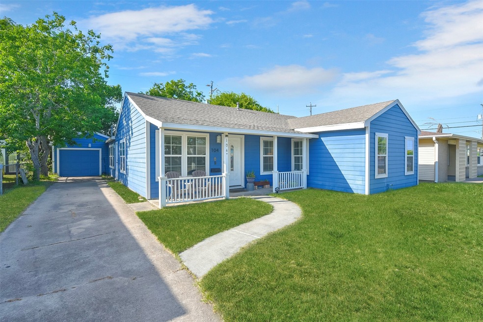 Welcome to 104 Pompano Avenue! Notice the extensive driveway, which leads to the single car garage.