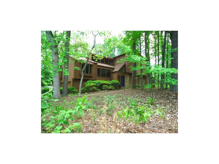 Exterior Front. Earthy Contemporary Nestled in the