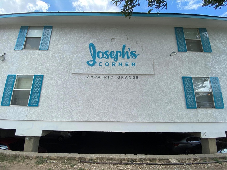 View of side of property featuring stucco siding
