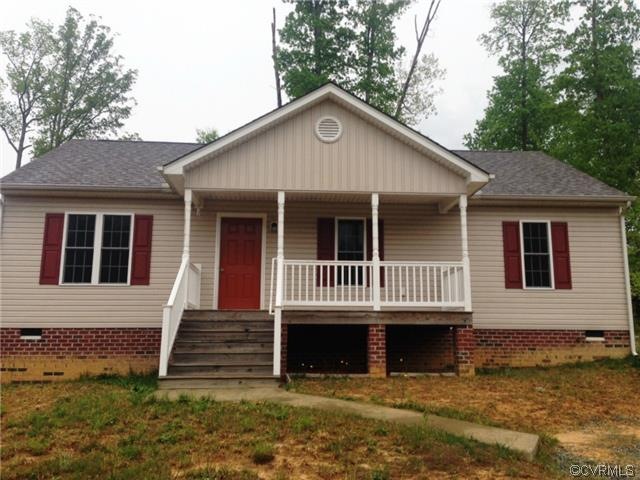 Exterior Front. Concrete sidewalk. Front porch.