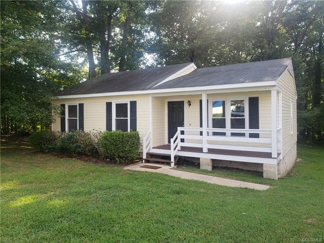 Ranch with vinyl siding and updated windows.