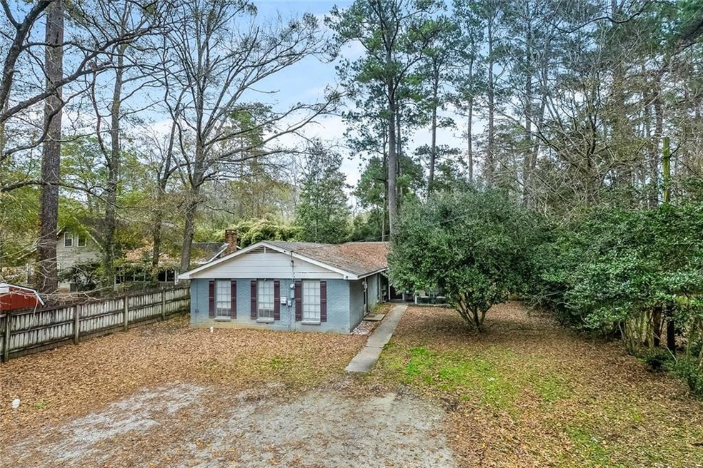 Income producing Covington duplex on 100 x 150 lot