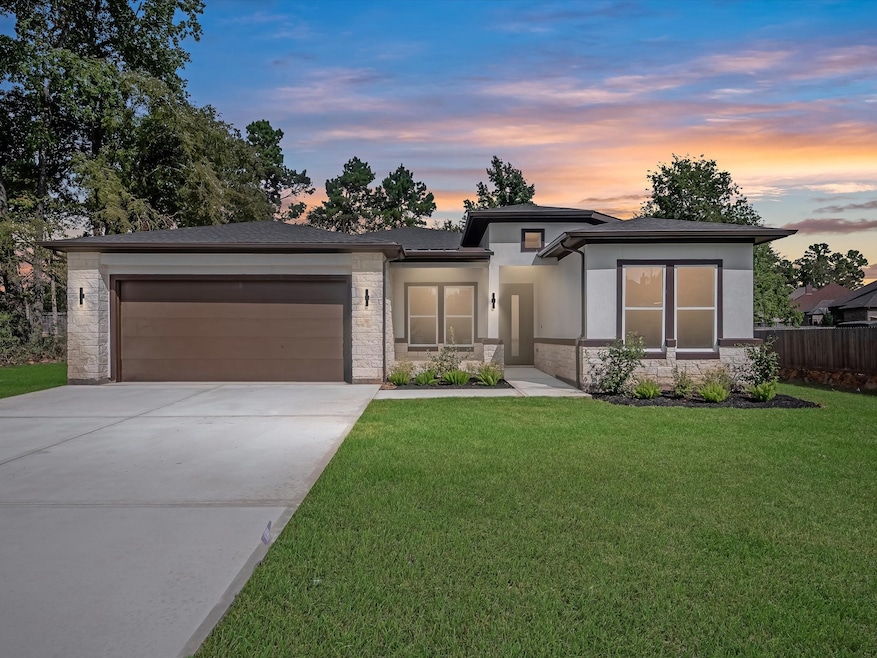 New Construction on Half acre home-site, backing to a neighborhood pond with no rear neighbors, and directly across the street from the canals that provide access to Lake Conroe!