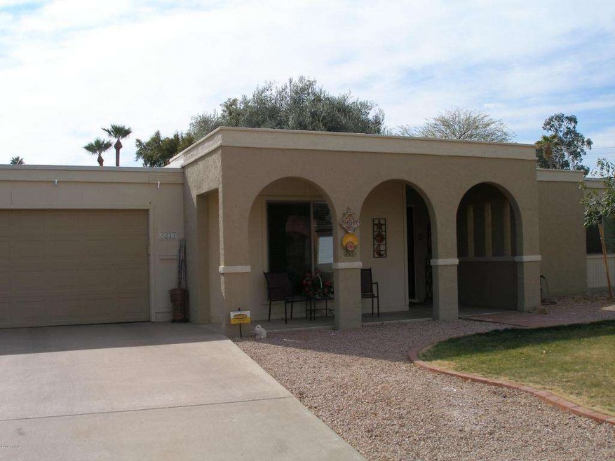 Front with Desert and Grassy yard