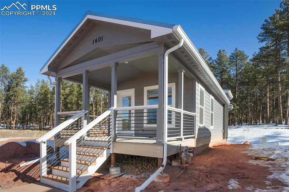 front of property with a covered porch