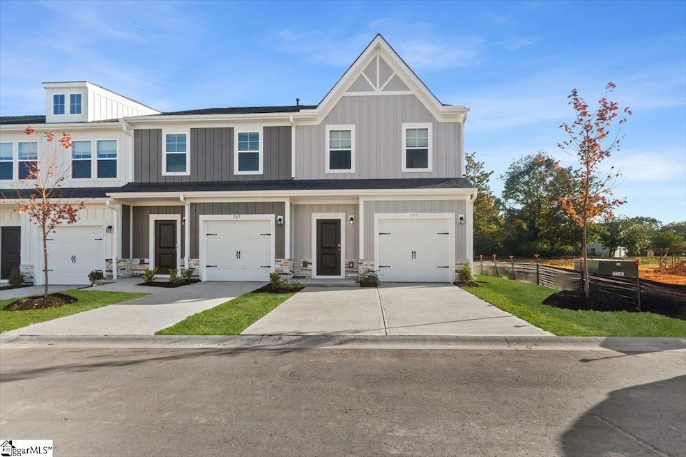 Home of the Week: This Stunning End Unit at Amaris  Step into your dream home at Amaris, Mauldin’s newest townhome community where charm, convenience, and craftsmanship come together beautifully.
