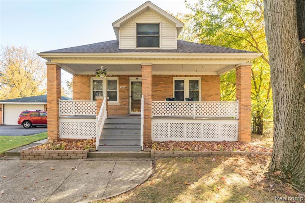 All brick bungalow on a one acre lot