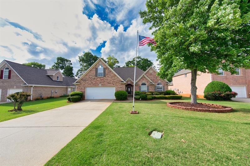This beautiful ranch home has a long, level you ar