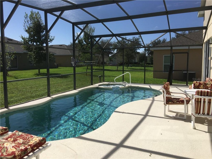 939 Andalusia Loop, Davenport, FL 33837 - photo 1