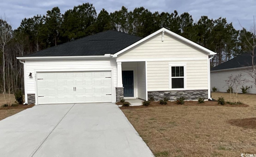 View of front of property featuring stone siding, 