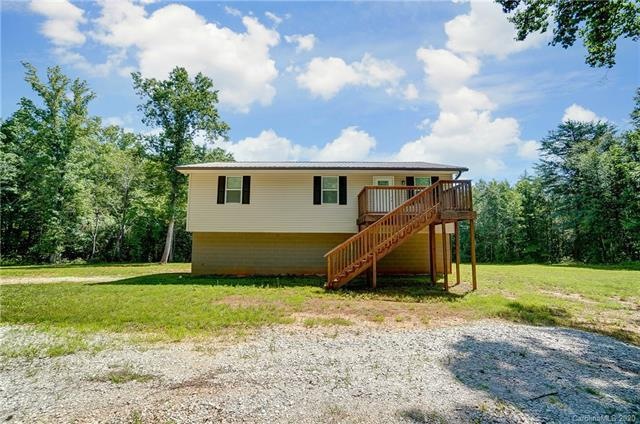 Charming 3BR, 1 BA home nestled on 15 acres wooded