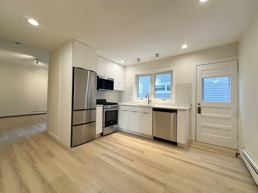 144 Spring St unit 2F, Cambridge, MA 02141 - photo 1