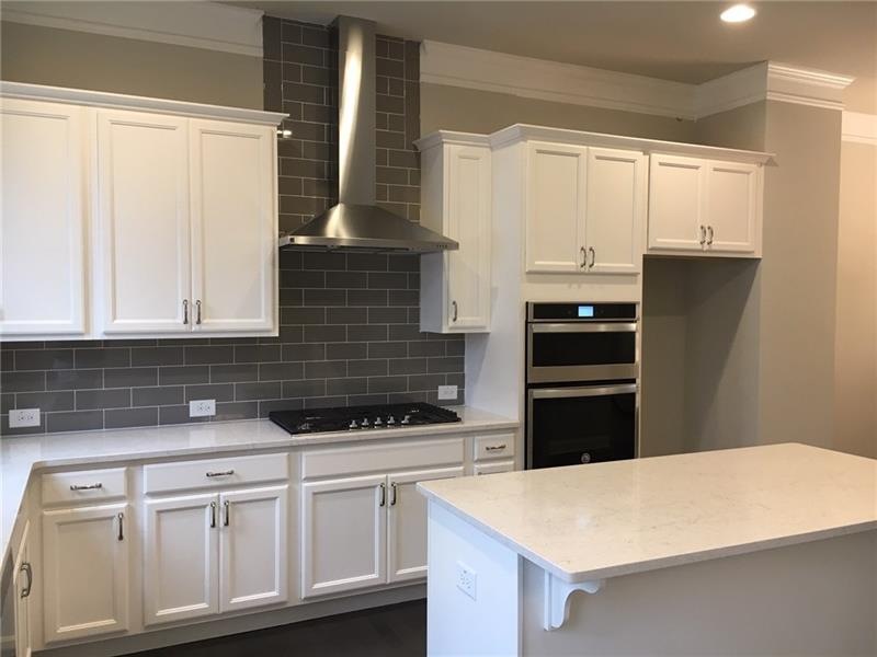 Gorgeous kitchen overlooking 18 ft deck. Stainless