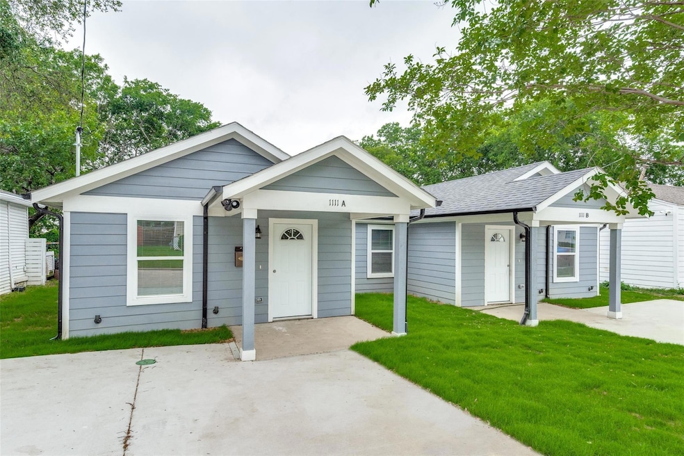 View of front of property with roof with shingles 