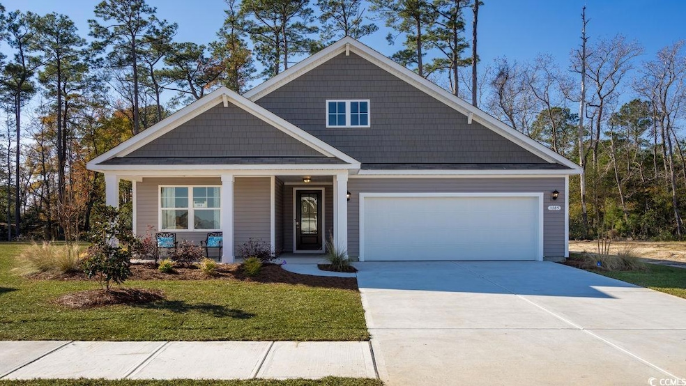 Craftsman-style home with a porch, concrete drivew