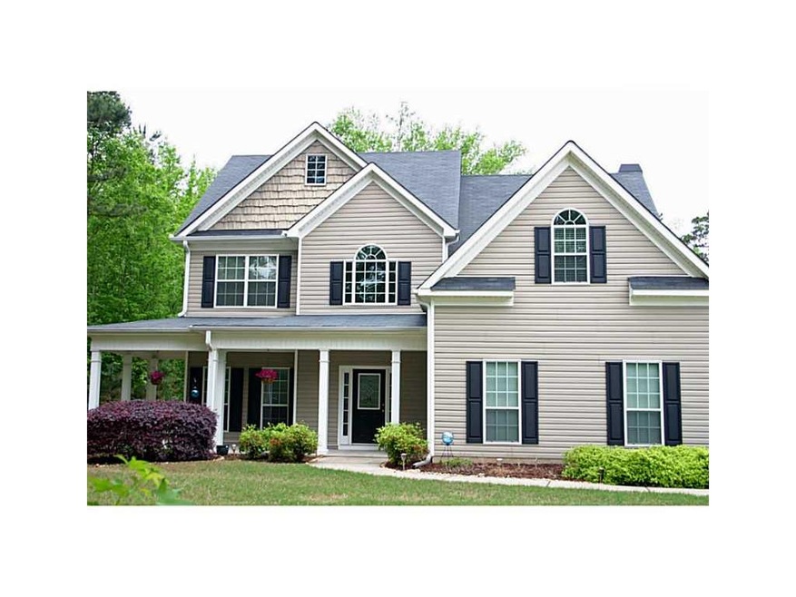 Exterior Front. Grand Home on over 1 level and pri