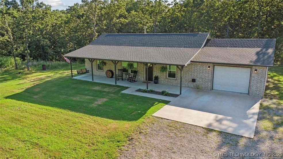 Full-brick beauty set on 5 peaceful acres—framed b