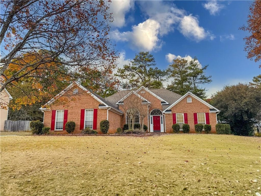 5555 Grove Place Crossing SW, Lilburn, GA 30047 - photo 1