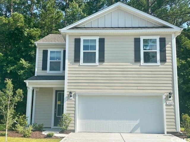 View of front of home with a garage