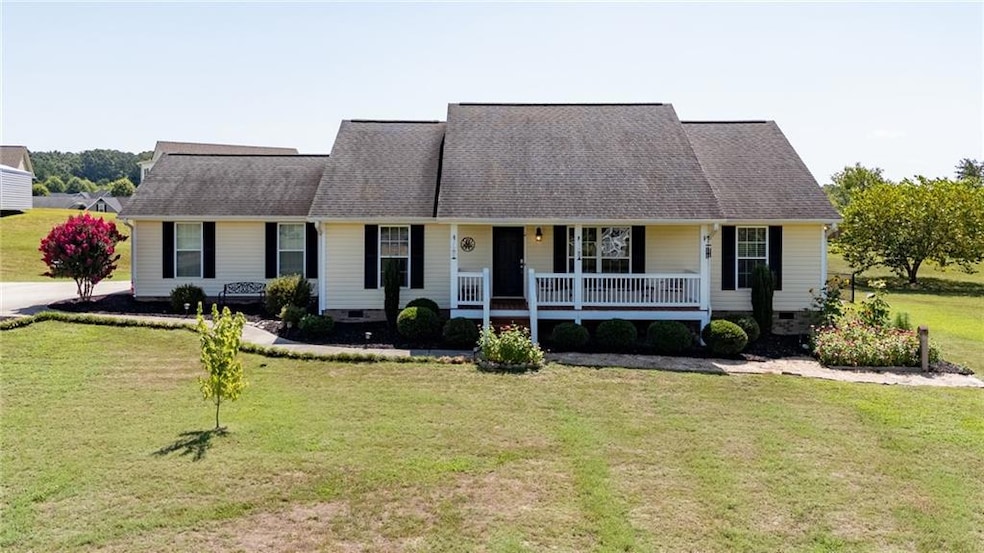 View of front of home featuring covered porch and 