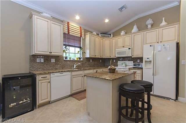 12843 Carrington Cir unit 202, Naples, FL 34105 - photo 1