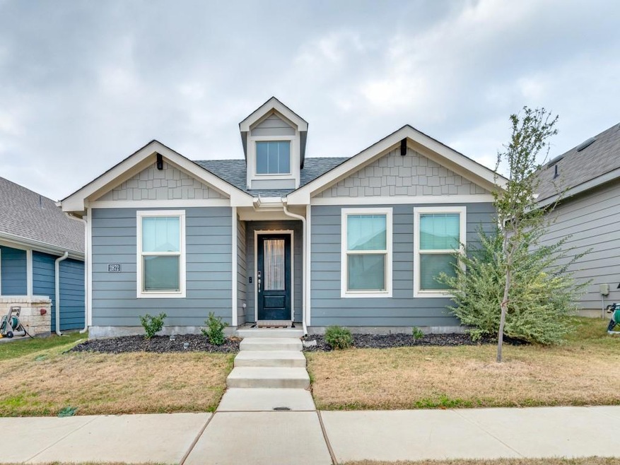 Bungalow-style house featuring a front lawn
