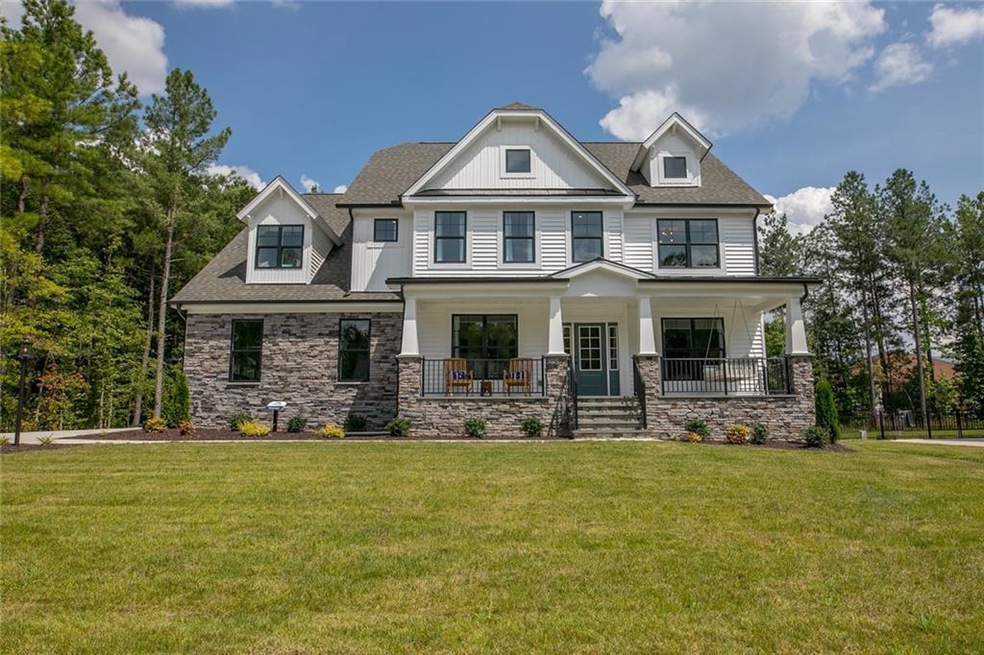 Gorgeous MODEL HOME in the Glen Royal section of Harpers Mill is now available! The Roanoke model is one of Eastwood Homes' most popular models. This home has it all. Beautiful exterior with oversized front porch and stone, fantastic lot with open sp