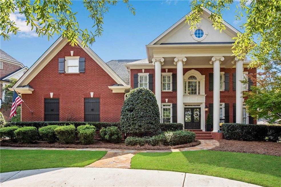 A circular driveway and beautiful curb appeal welcome you to this turn-key executive home!