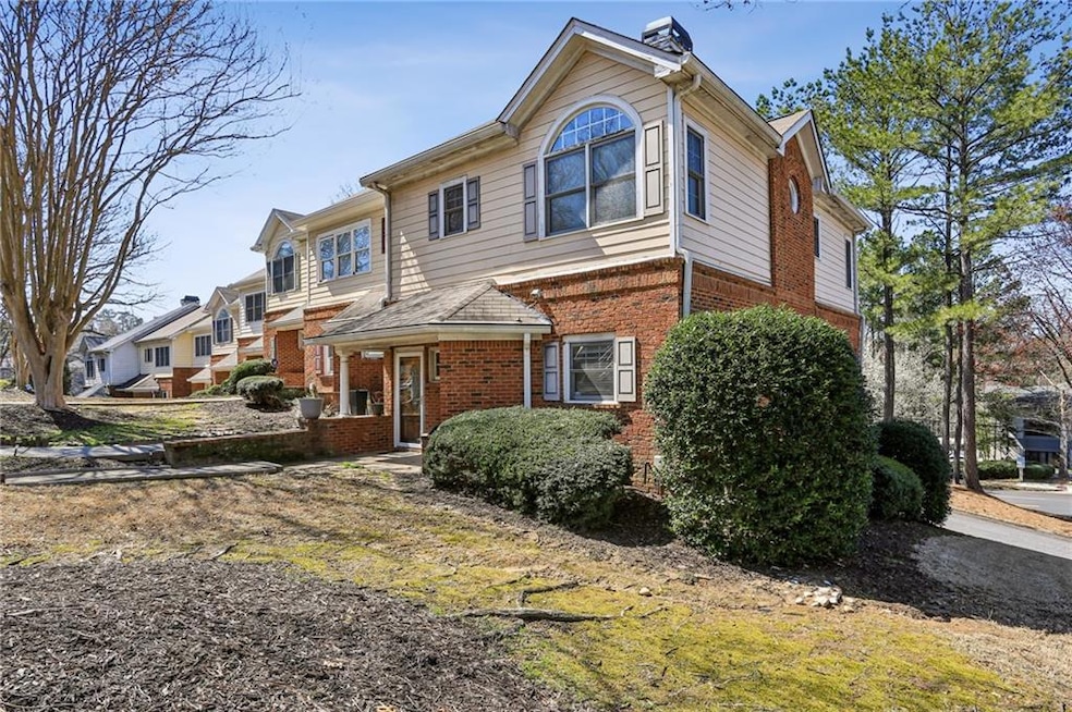 View of front of property featuring brick siding