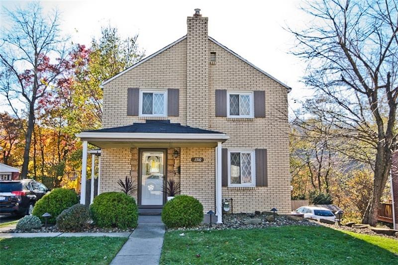So much curb appeal! Updated landscaping and finis