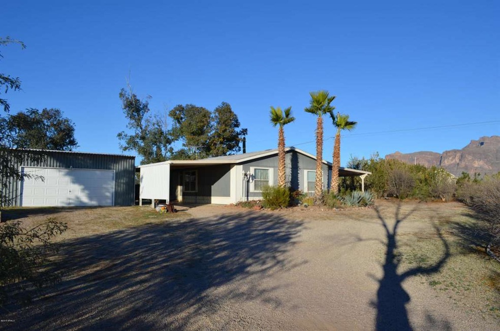 Attached carport and 2 car garage