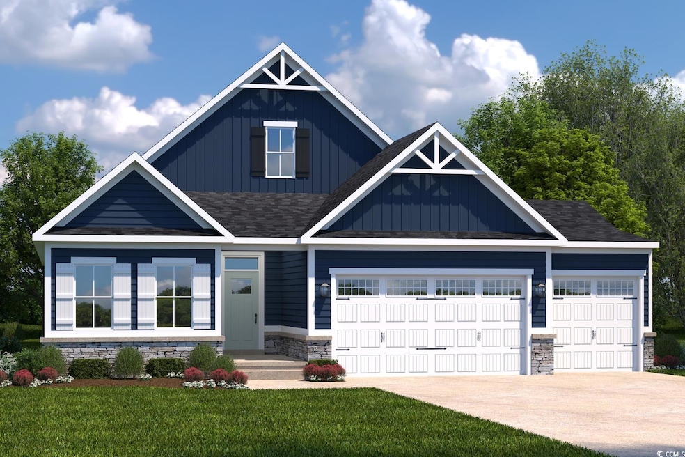 Craftsman inspired home featuring an attached gara
