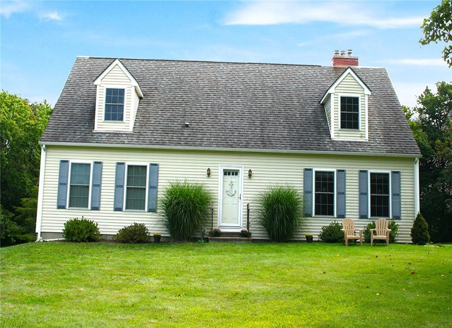 Front of home faces West towards West Main Road.