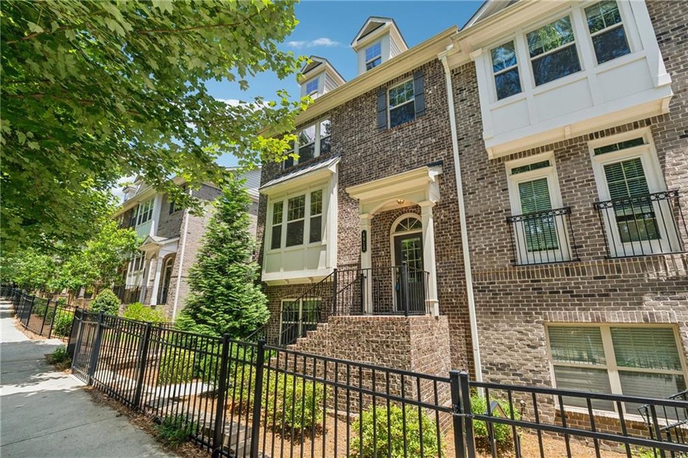 View of front of home featuring brick siding