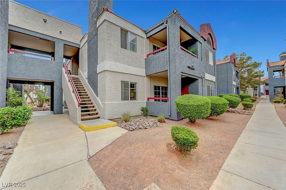View of property with stairs