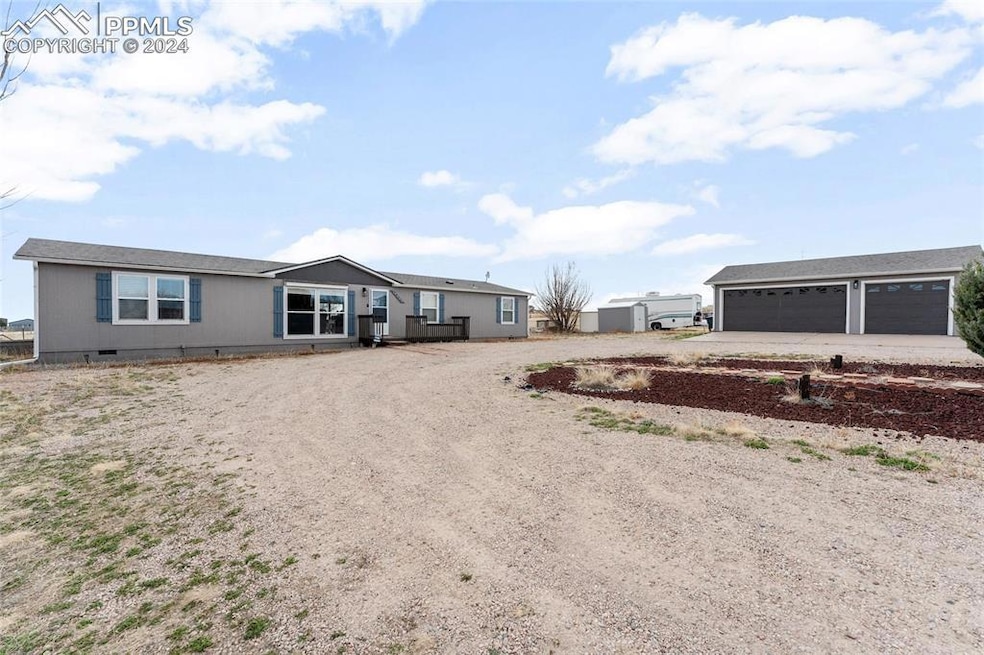 17555 Wagon Train Loop, Peyton, CO 80831 - photo 1