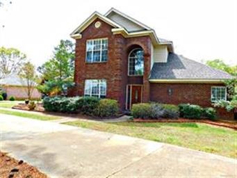 This home has a circular drive with a demanding pr