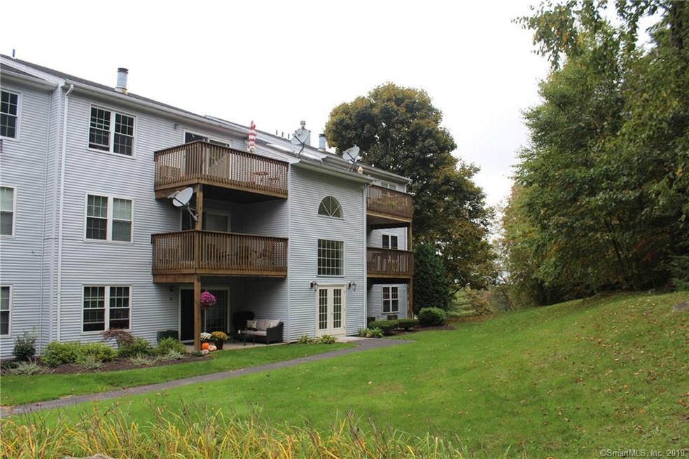 Back of building. Top right is the deck for this h