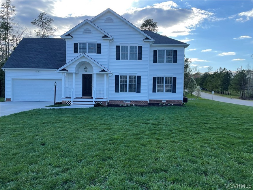 Front of Home with Spacious Corner Lot