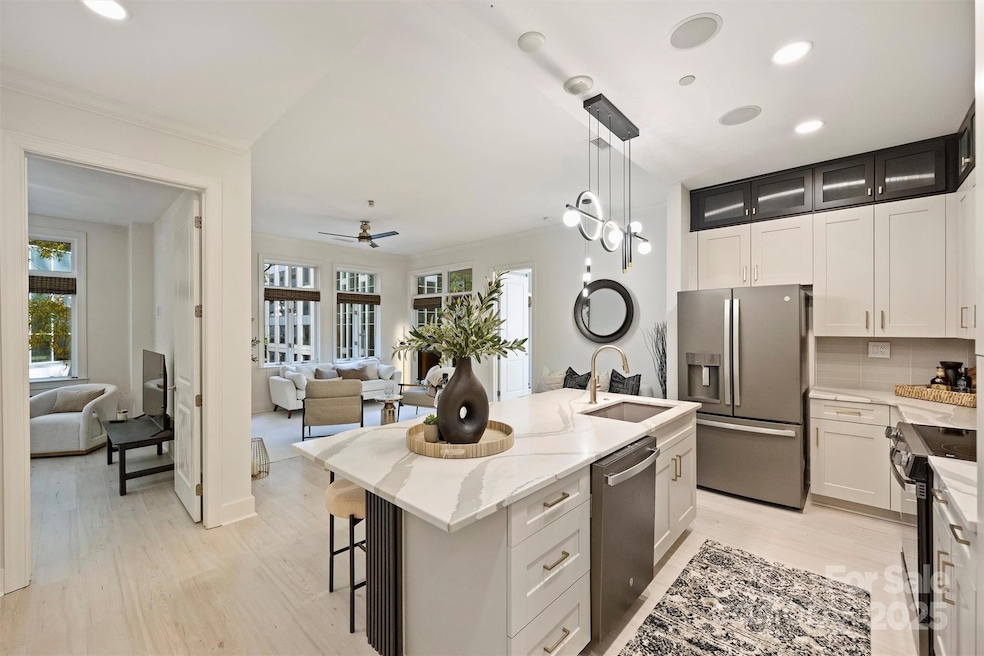 230 S Tryon St unit 307, Charlotte, NC 28202 - photo 1