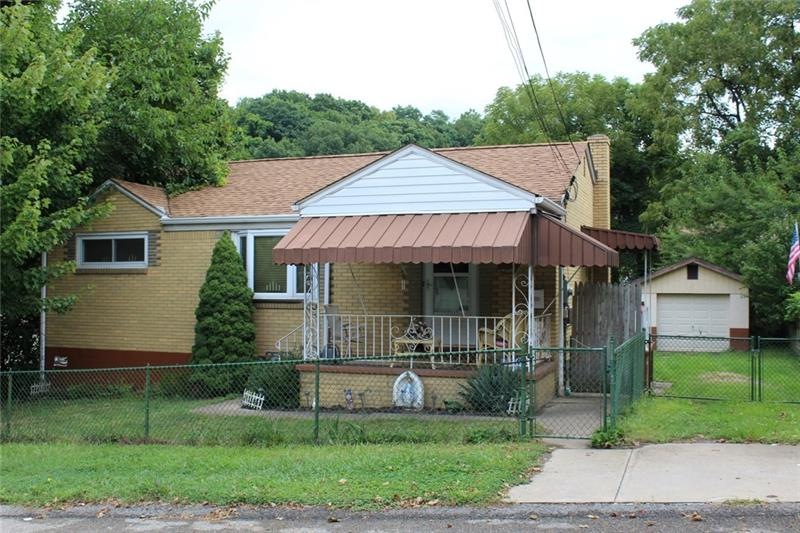Updated Brick Ranch with newer roof, windows, fron