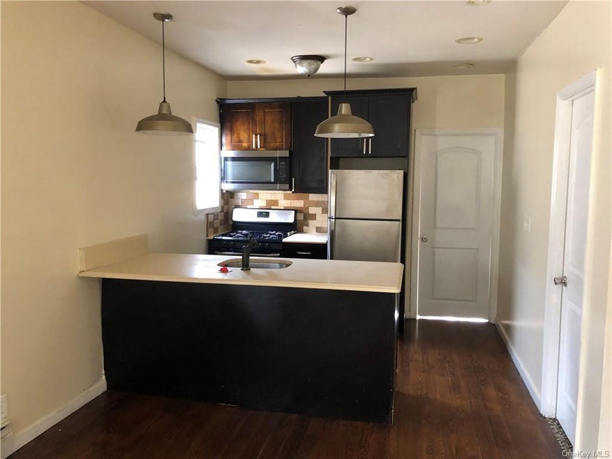 168-28 106th Ave, Jamaica, NY 11433 - photo 1