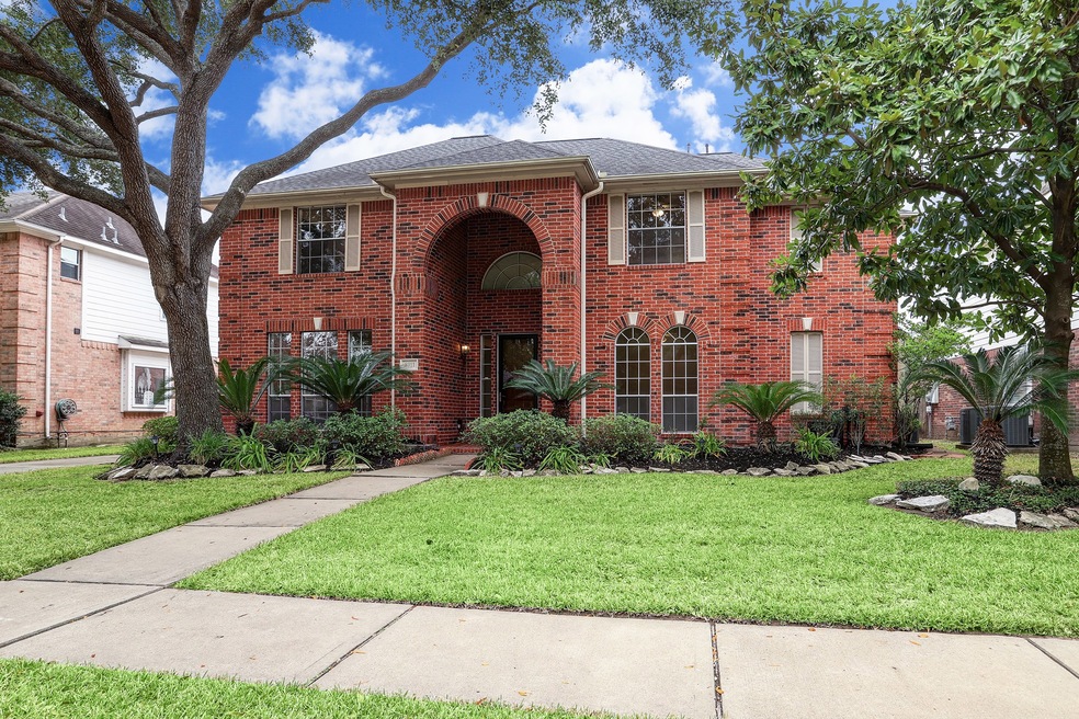 8911 Apple Mill Dr, Houston, TX 77095 - photo 1