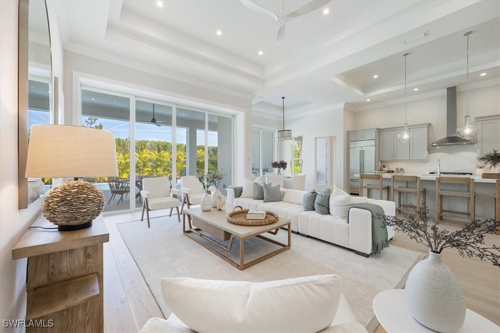 The open concept main living area features white o