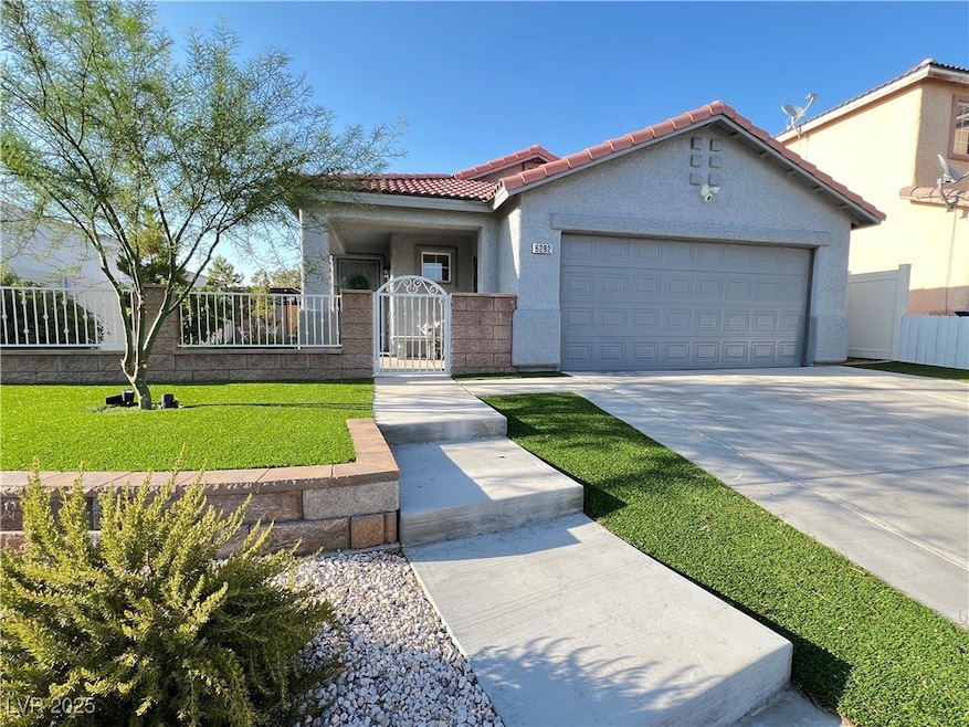 View of front of property featuring a tiled roof,